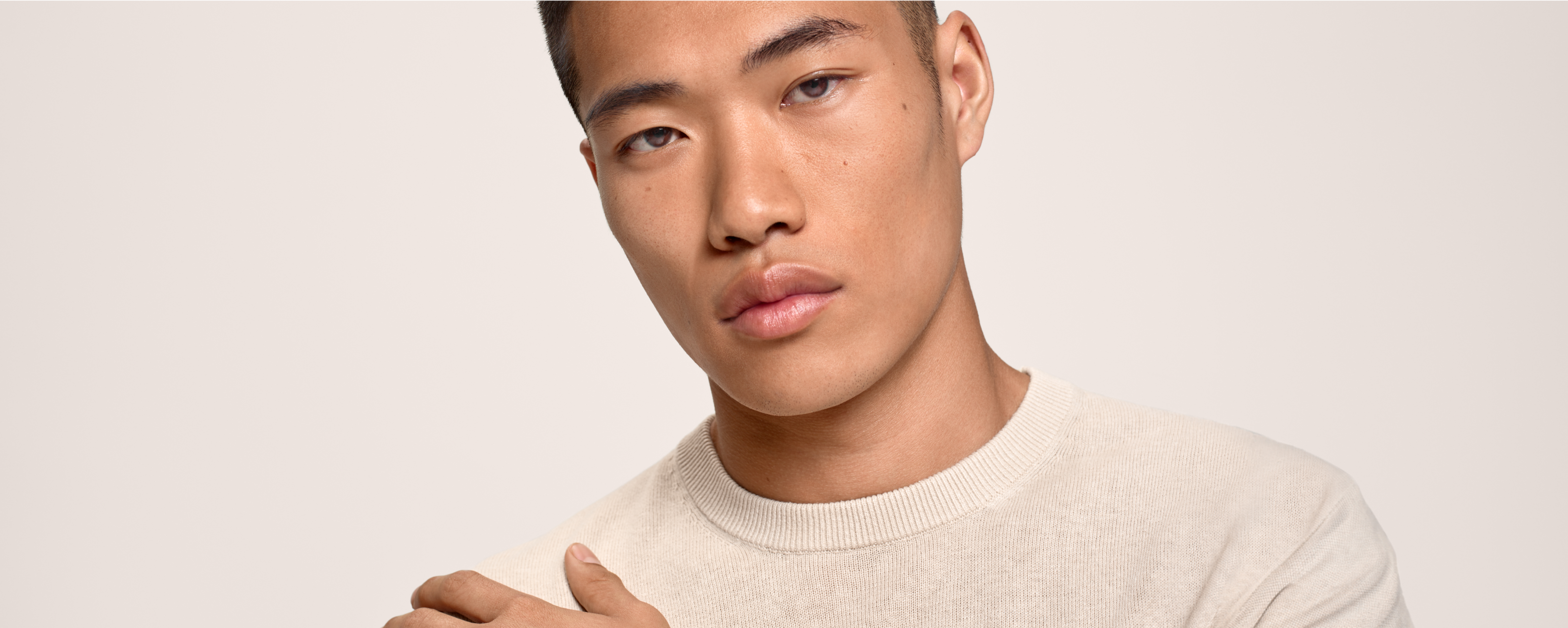 Full width SunsolveMD feature banner with model and SPF